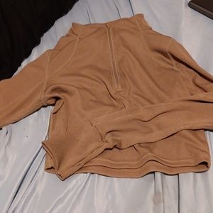 Cropped long sleeve zip up turtle neck with thumb holes